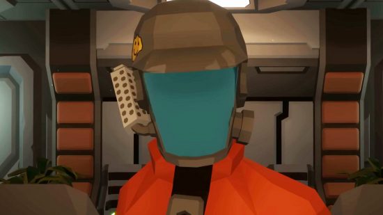 A person in a blue and grey mask, their faceplate down, wearing an orange suit in a nondescript room.