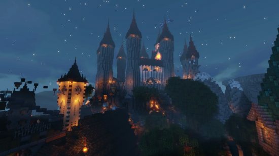 A castle under a night's sky, with glowing lights in the windows, in the Minecraft server SootMC.