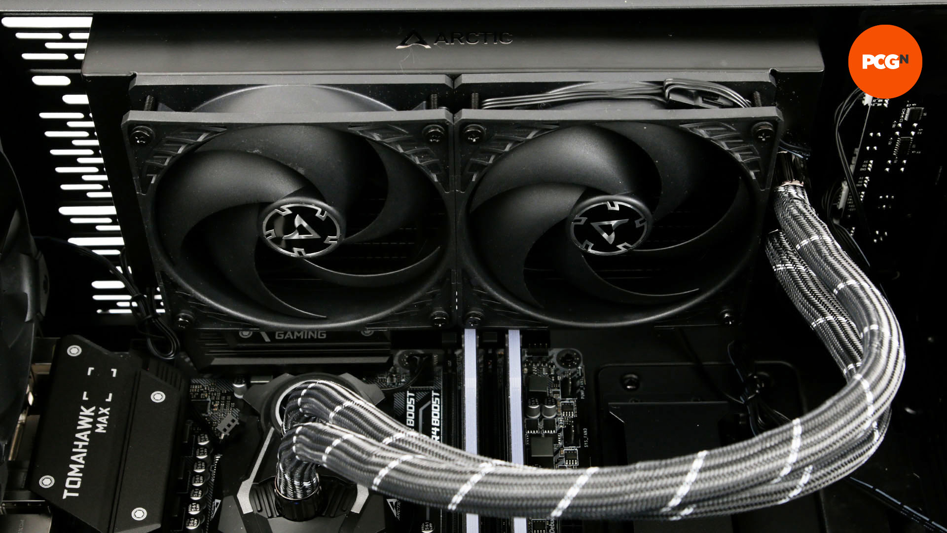 An AIO cooler radiator mounted to the top of a PC case for PC cooling