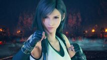 The Final Fantasy character we want in Tekken 8 isn't coming, yet:A pretty anime girl with flowing blue hair grimaces into the camera, raising her gloved fists wearing a white tank top