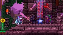 Terraria 1.4.5 State of the Game reveals new dev armor and decoration tool - Developers Redigit and Cenx 'knight' fellow Re-Logic programmer Chicken Bones with his new armor set.