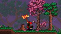 Terraria 1.4.5 update adds upgrades for axes, boomerangs, and AFK farming with new hopper - A character swings a molten hamaxe at a cherry blossom tree.