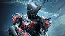 Everyone will get Warframe cross save, but fixes are required first: An armored character with red trims holding a gun in an underwater setting looking to its right