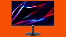 The Acer Nitro XV271U M3bmiiprx gaming monitor against an orange background