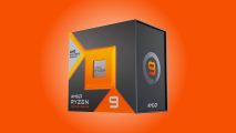 An AMD Ryzen 9 7900X3D retail package against an orange background