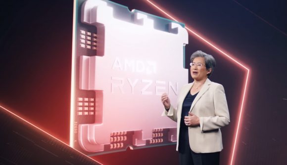 AMD CEO Dr Lisa Su standing next to a large projection of a Ryzen processor