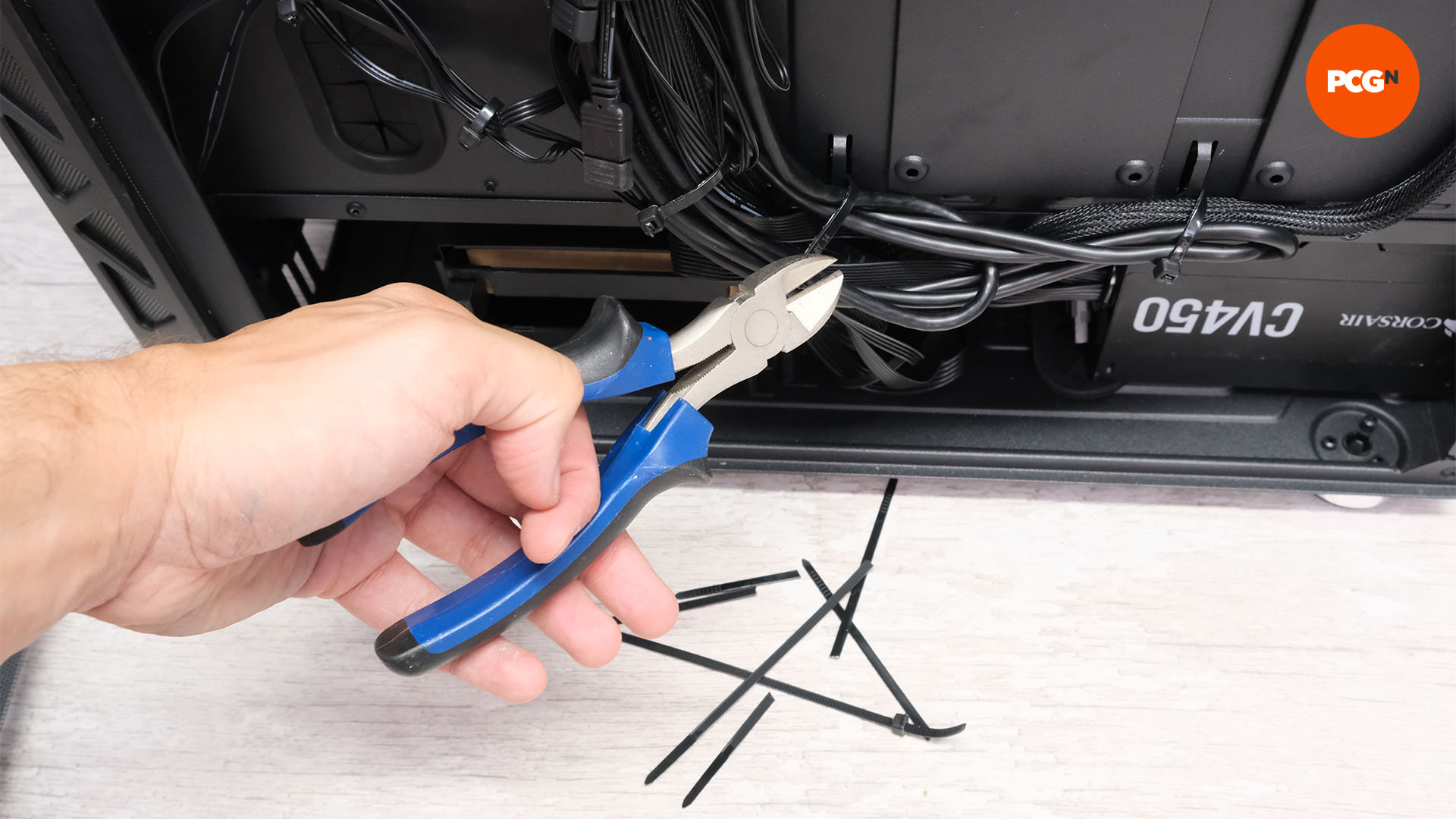 How to build a gaming PC: Snip the ends off the cable ties with some side cutters