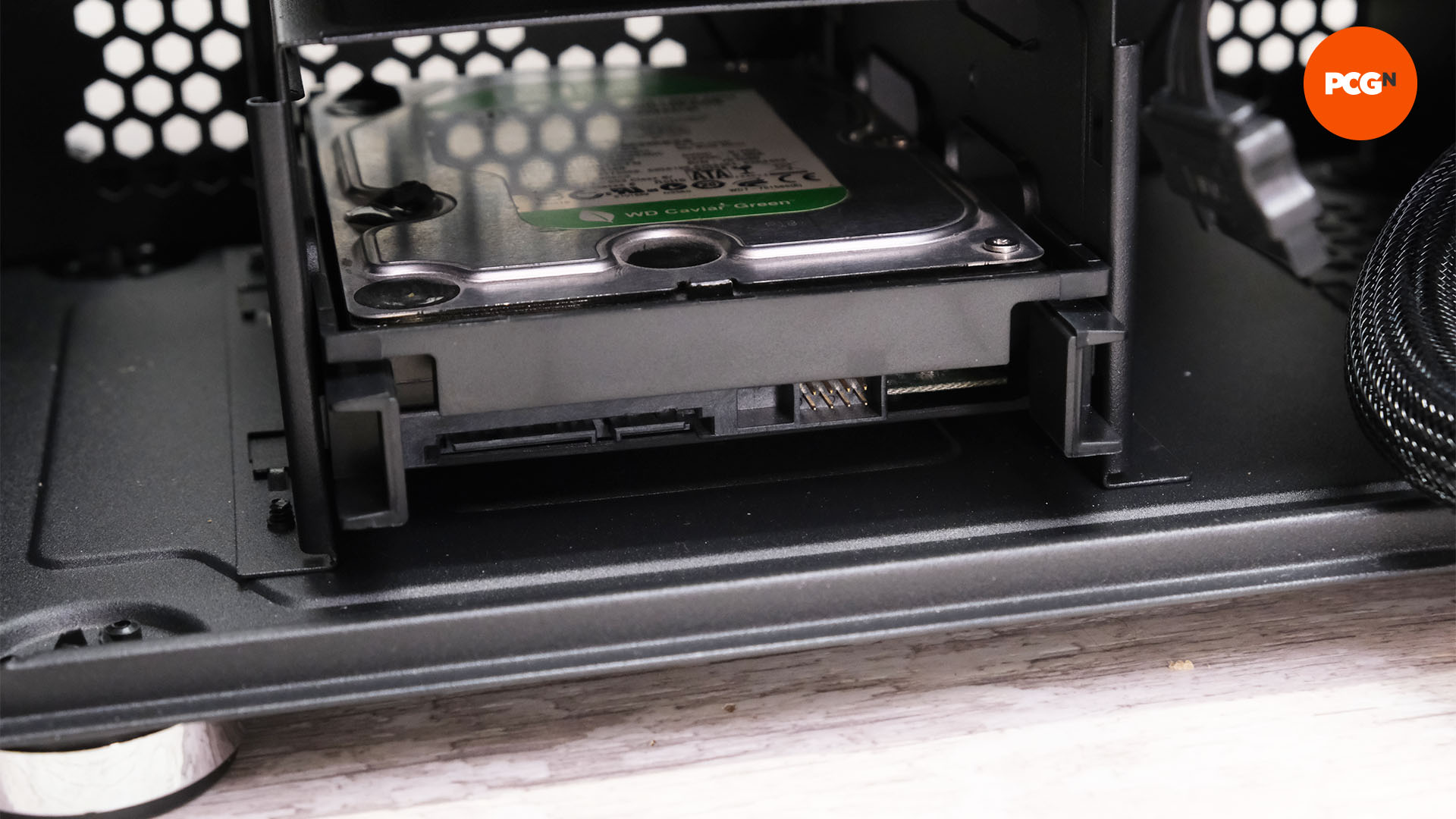 How to build a gaming PC: Install 3.5-inch hard drive in case