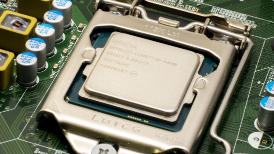 An Intel Core i5 4590 CPU nestled in a motherboard