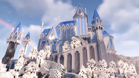 Megrae's Minecraft ice castle, a majestic blue and white building towering above snowy mountains.