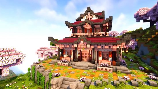 An image of a beautiful Japanese Minecraft house, built from cherry wood and other matching blocks, in a cherry grove biome.