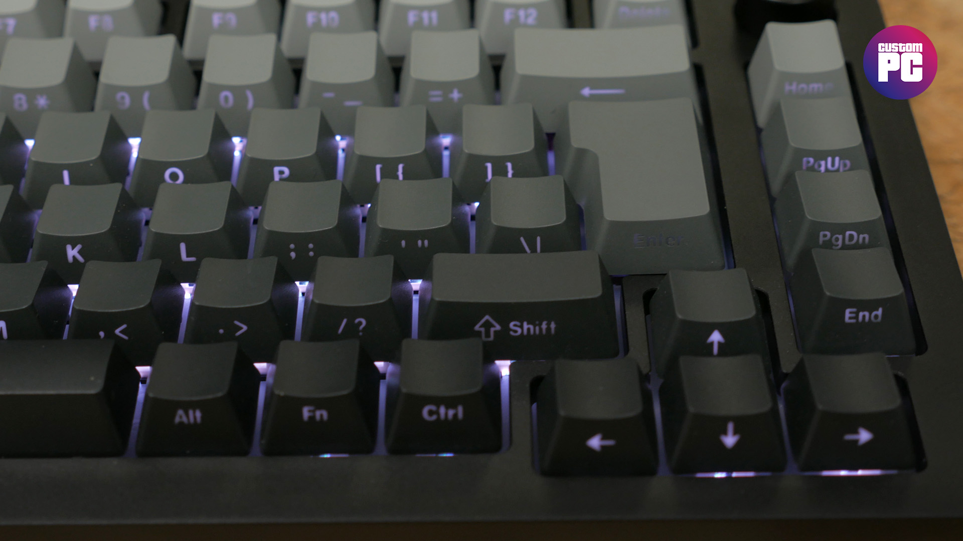 Monsgeek M1W SP review image showing backlighting behind the keys.