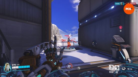 Overwatch 2 Season 9 - Zenyatta in the training room tries to land headshots on a Tracer, but they hit her arms instead.
