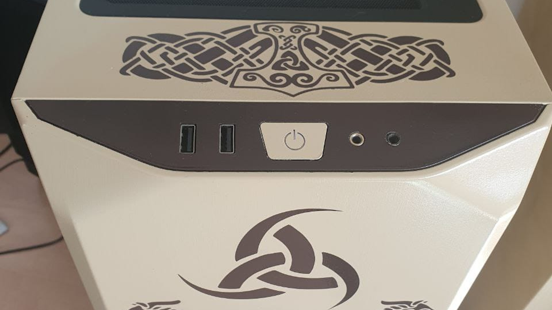 The front panel of the custom PC case which has a viking theme