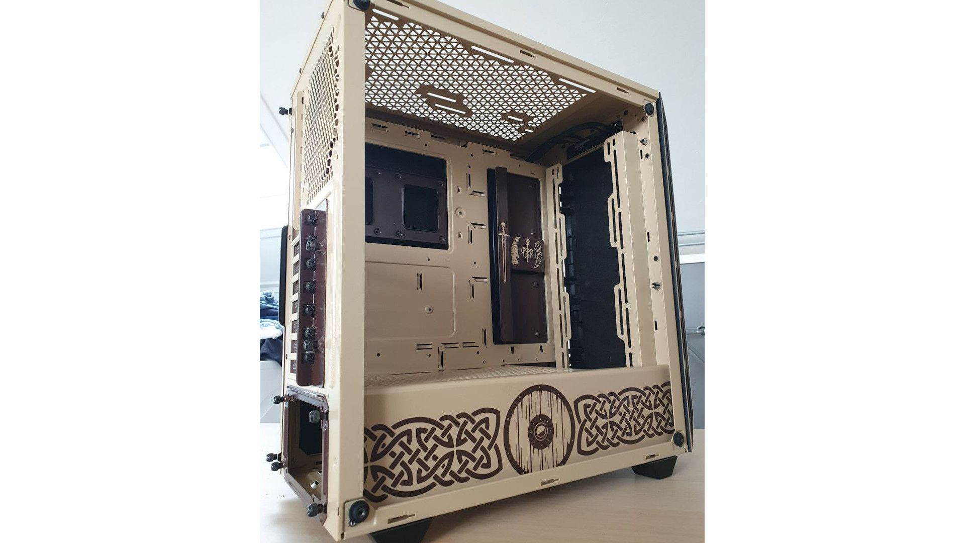 The inside of a custom PC case which has a viking theme