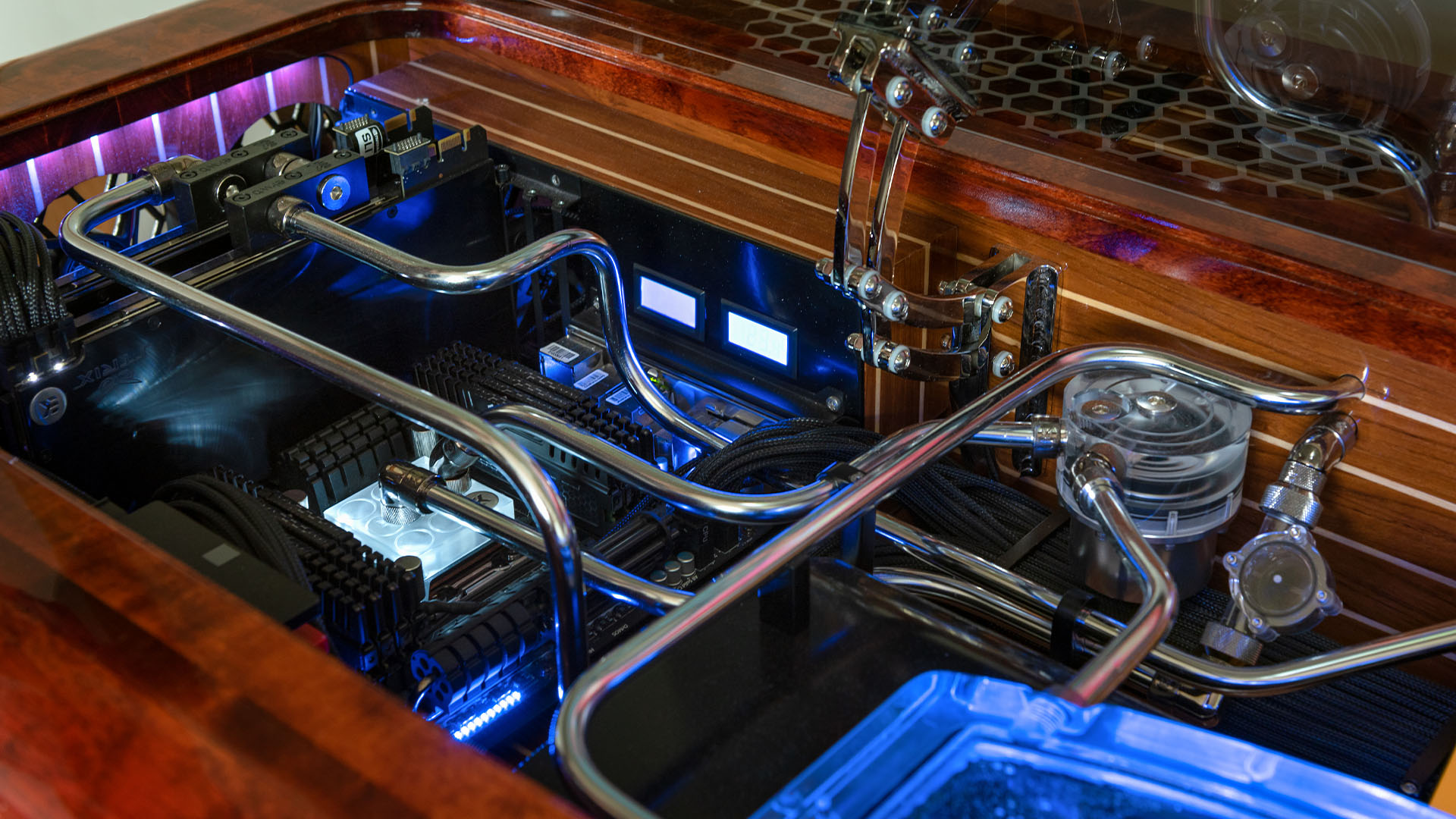 The custom waterloop inside a wooden desk PC