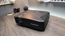 The Acer Predator G711 projector on a table