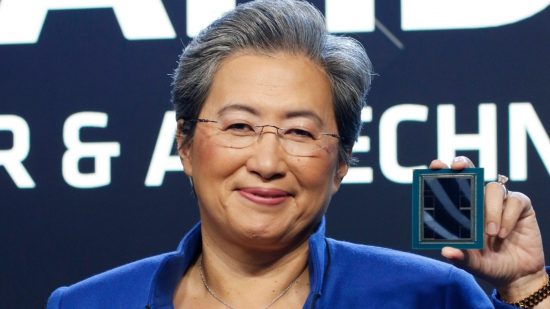AMD chair and CEO, Dr. Lisa Su, holding a processor in her hand (right)