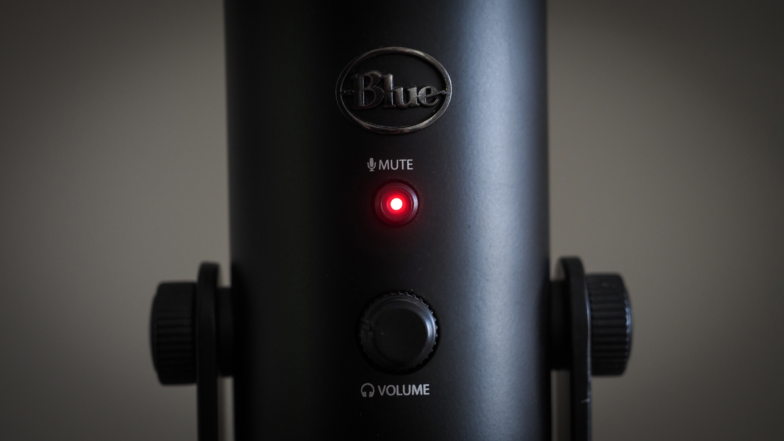 Blue Yeti review image showing a close up of the mute button, with the light on.