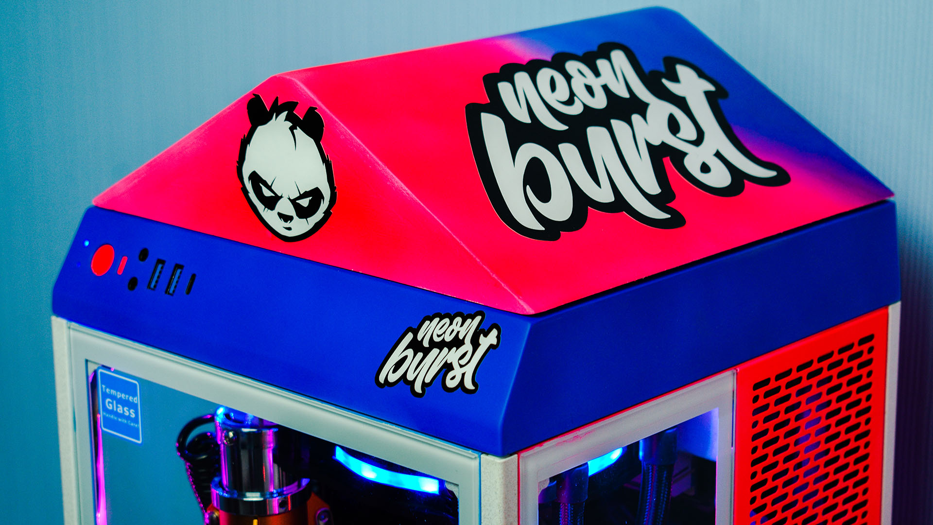 Claw machine gaming PC in bright red and blue colors