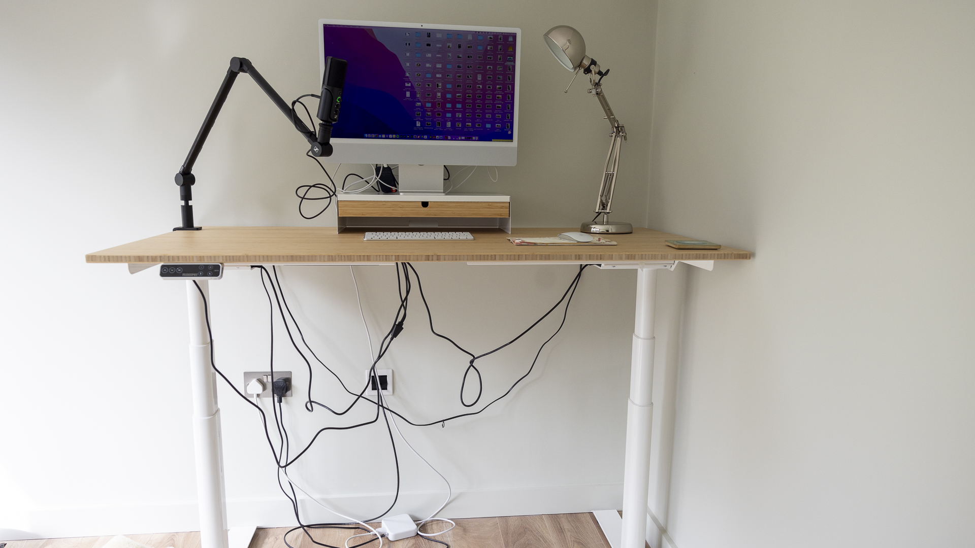 Flexispot E8 Standing Desk review image showing the desk fully erect.