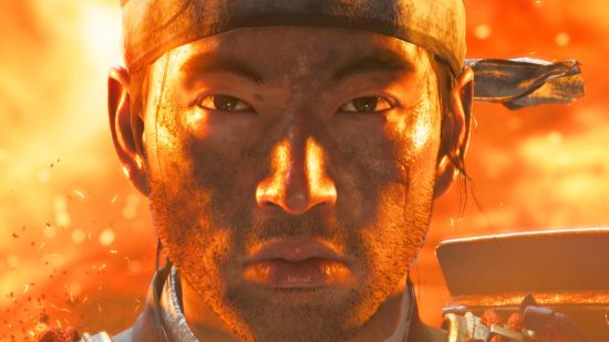 Ghost of Tsushima PC Steam: a man stood in front of a raging fire