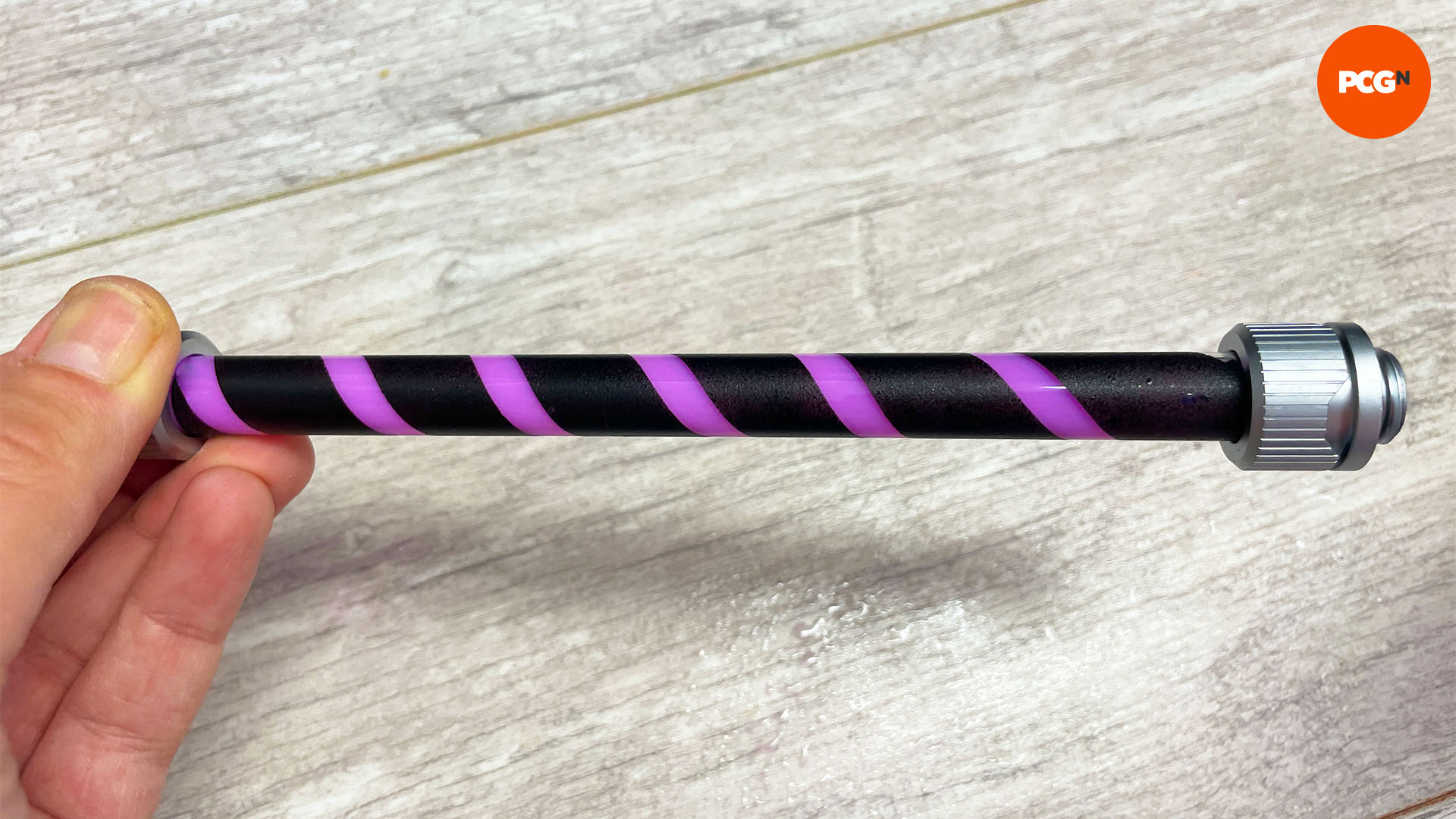 How to paint hard acrylic water cooling tubing: Finished painted tube with purple coolant