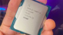 Intel Core i5 12400F held in hand