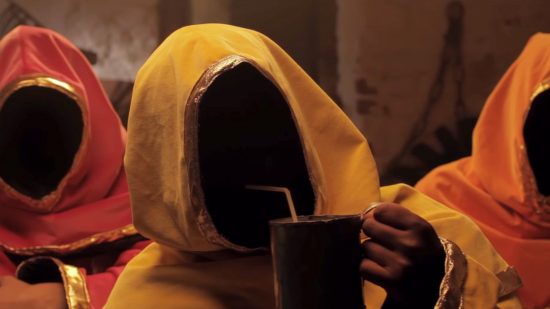 Magicka Steam sale: a person in a yellow hooded robe with a shadow covering thweir face, as they drink from a mug with a straw