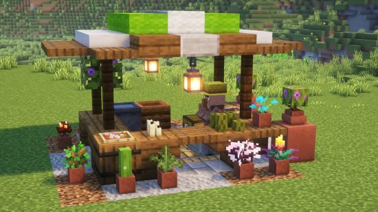 A villager stands inside a cute market stall, on of the best Minecraft build ideas.