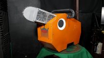 A Pochita-themed gaming PC with a chainsaw sticking out