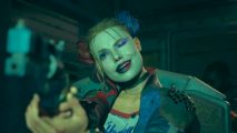 Suicide Squad Kill the Justice League Steam sale: DC's Harley Quinn holding up a pistol and closing one eye to aim down the sight