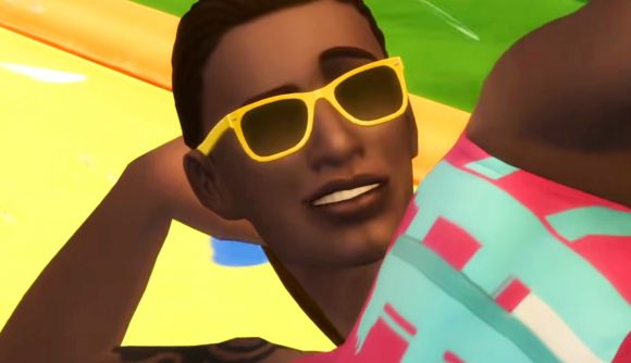 The Sims 4 Backyard Stuff is a free DLC on Steam and the EA store right now - A man wearing yellow sunglasses reclines with a smirk.