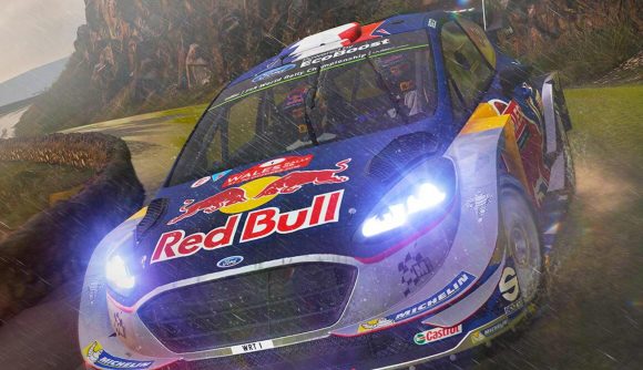 WRC 7 Steam sale: two people in a Red Bull rally car, with rain falling around them