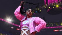 WWE 2K24 unlockables: Bianca Belair is wearing a pink wrestling outfit with a jacket, and is swinging her extremely long single braid in the air.