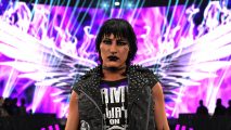 WWE 2K24 review: Rhea Ripley in full goth Mami makeup, walking out as the Titantron shows wings behind her.