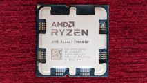 AMD Ryzen 7 7800X3D CPU against a red carpet background