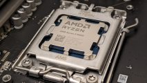 An AMD Ryzen processor lodged in a motherboard socket