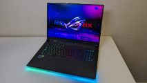 A wide shot of the ROG Strix Scar 18 (2024) gaming laptop