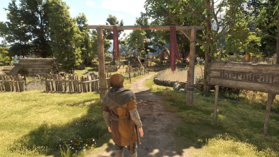 Bellwright early access review: the entrance to a small medieval town.