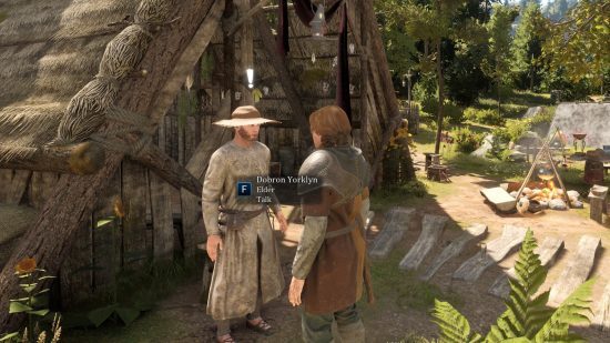Bellwright early access review: the player character talking to a village elder.