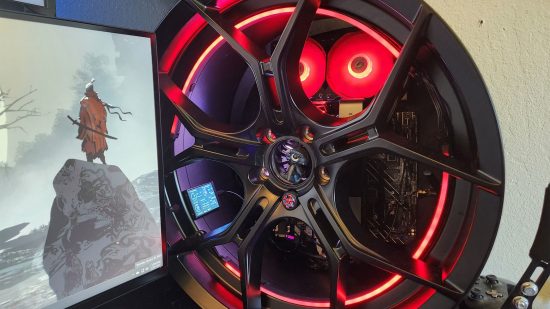 A gaming PC inside the alloy of a car wheel