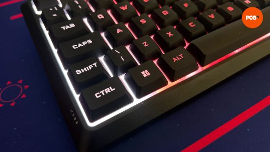 an angled closeup of the corsair k55 core while it is lit up