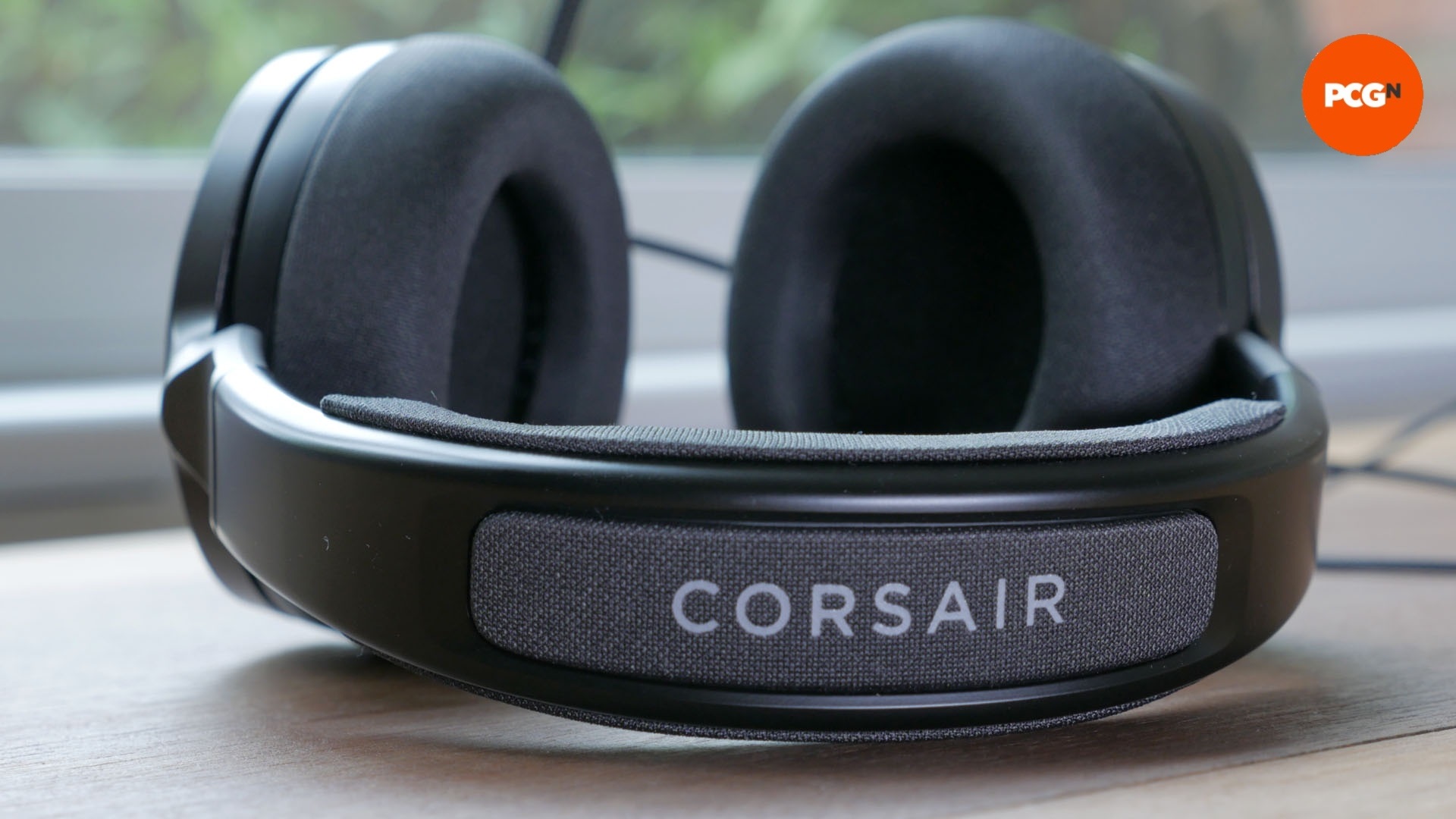 Corsair Virtuoso Pro review image showing the Corsair logo on the headband.
