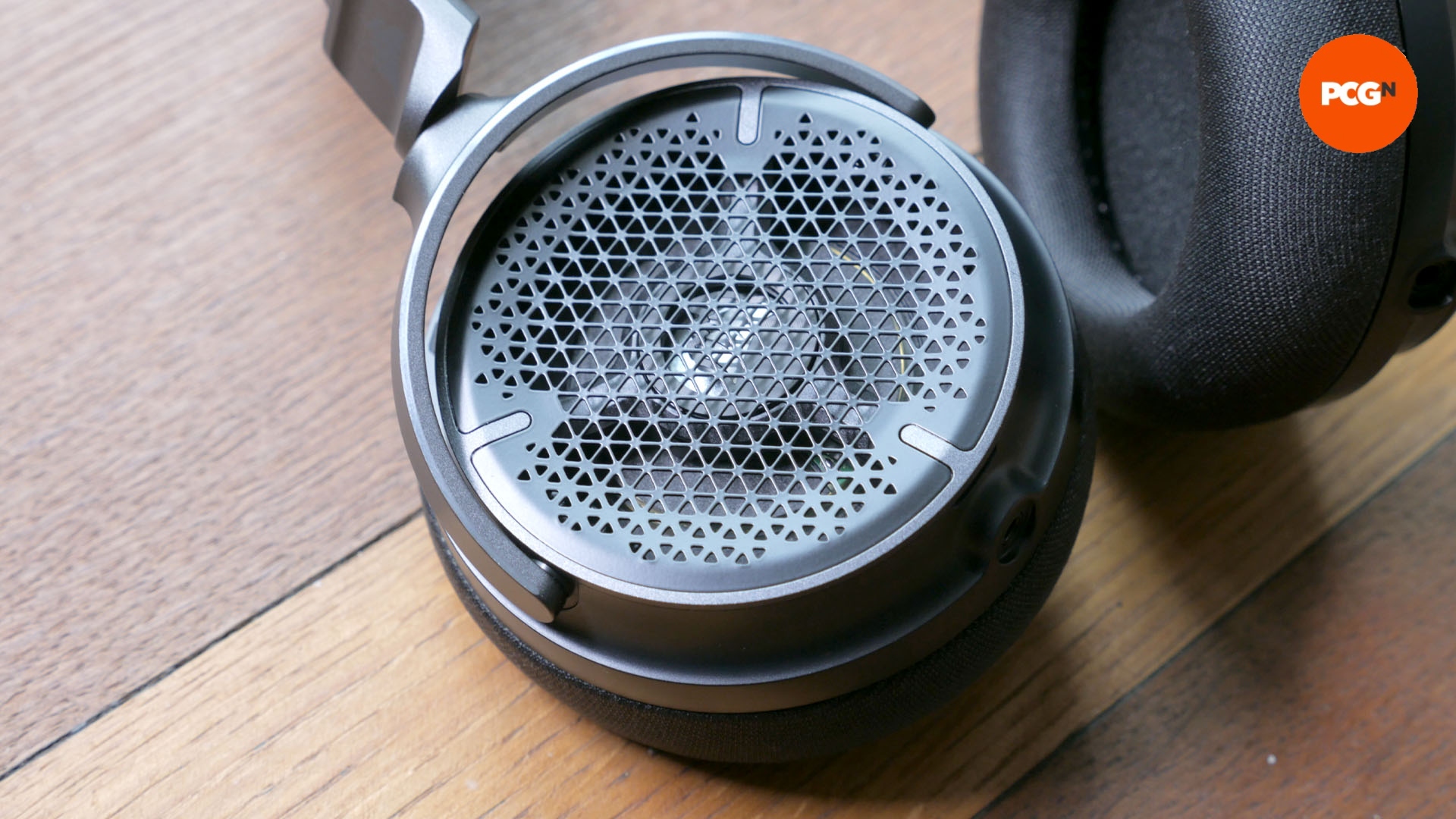 Corsair Virtuoso Pro review image showing the microphone in the earcup.