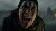 An image of Senua from Hellblade 2 screaming with blue tribal facepaint across her face.