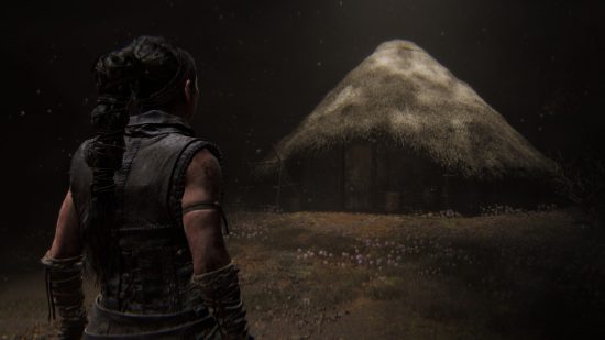 Senua approaches her childhood home, a hut constructed in a traditional Pictish fashion in Hellblade 2.