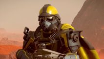 Helldivers 2 crashes: a super soldier in black and yellow sci-fi armor