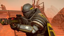 Helldivers 2 update 01.000.202: a super soldier in black and yellow armor readying a gun