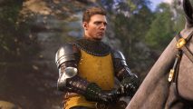 Kingdom Come Deliverance 2 announced with best boy Henry back for more: Henry sits astrride a horse, wearing armor, looking pensive.